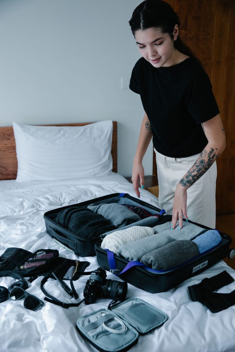 Neatly organized suitcase packed for travel